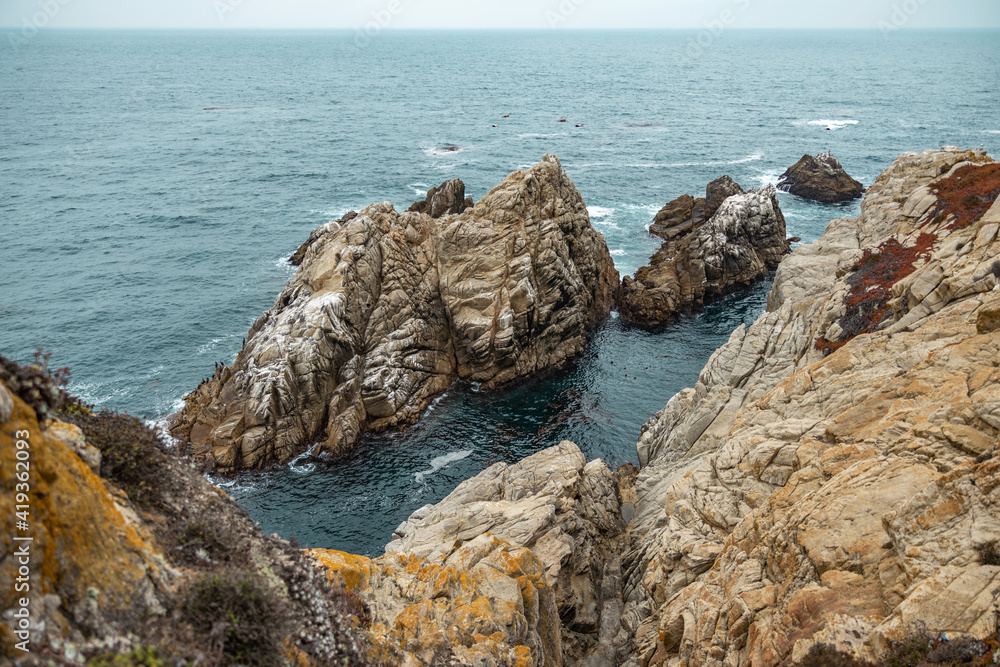 Beautiful landscape, view rocky Pacific Ocean coast at Point Lobos State Reserve in Carmel, California. Beautiful landscape, view rocky Pacific Ocean coast at Point Lobos State Reserve in Carmel, California.