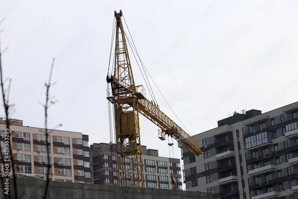 construction crane on the background of construction site