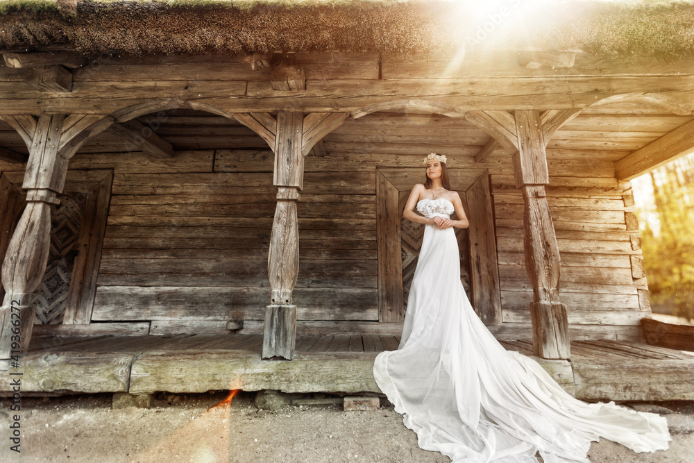 Obraz premium Bride White Dress. Romantic Woman Wedding White long Gown. Fantasy Old fashioned bridal Clothing. Antique Style Wooden House