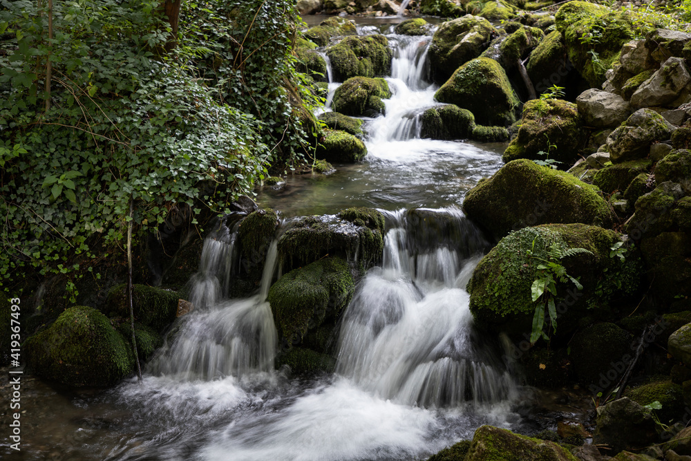 Waterfalls and rapids of a mountain stream Waterfalls and rapids of a mountain stream