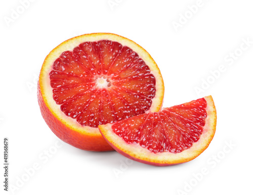 Cut ripe red orange isolated on white