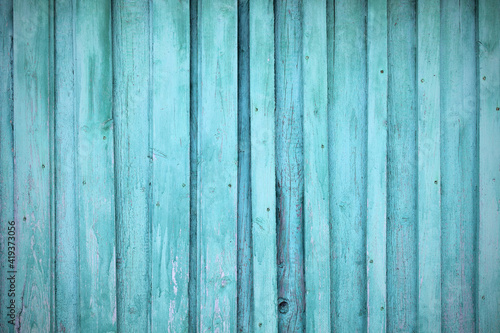 Old wooden painted blue boards. Close-up. Vertical view. Background. Texture.