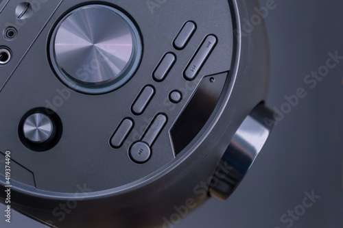 sound speakers.black music subwoofer, volume control more and less. aux, mic vol, play, stop, fm. horizontal photo. flat lay