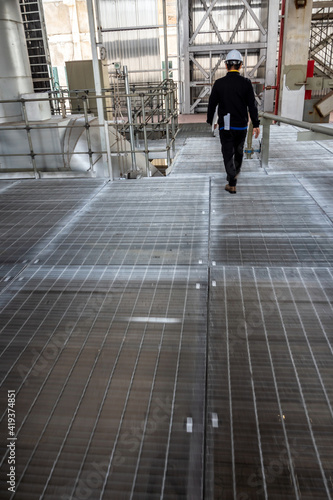 Slika na platnu Metal grating walkway on the mill