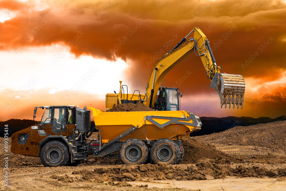 excavator at work on construction site excavator at work on construction site