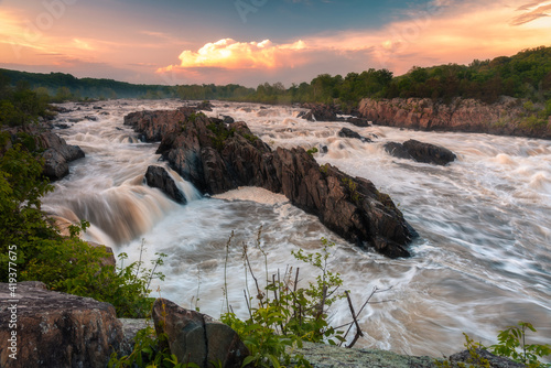 Stormy sunset skies over Great Falls Park in Virginia in the Summer. photo