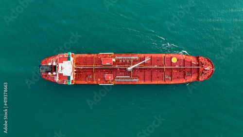 Aerial Top view of oil tanker ship sailing on open sea. Crude oil tanker lpg ngv at industrial estate Thailand - Oil tanker ship to Port of Singapore - import export