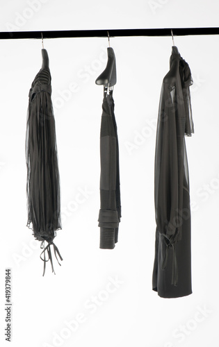 Elegant and trendy women's clothes hanging