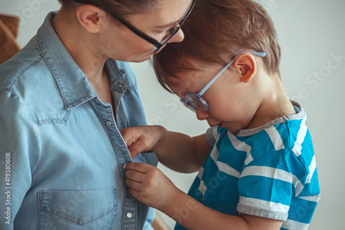 Child Toddler three years asks mom to breastfeed, prolonged breas