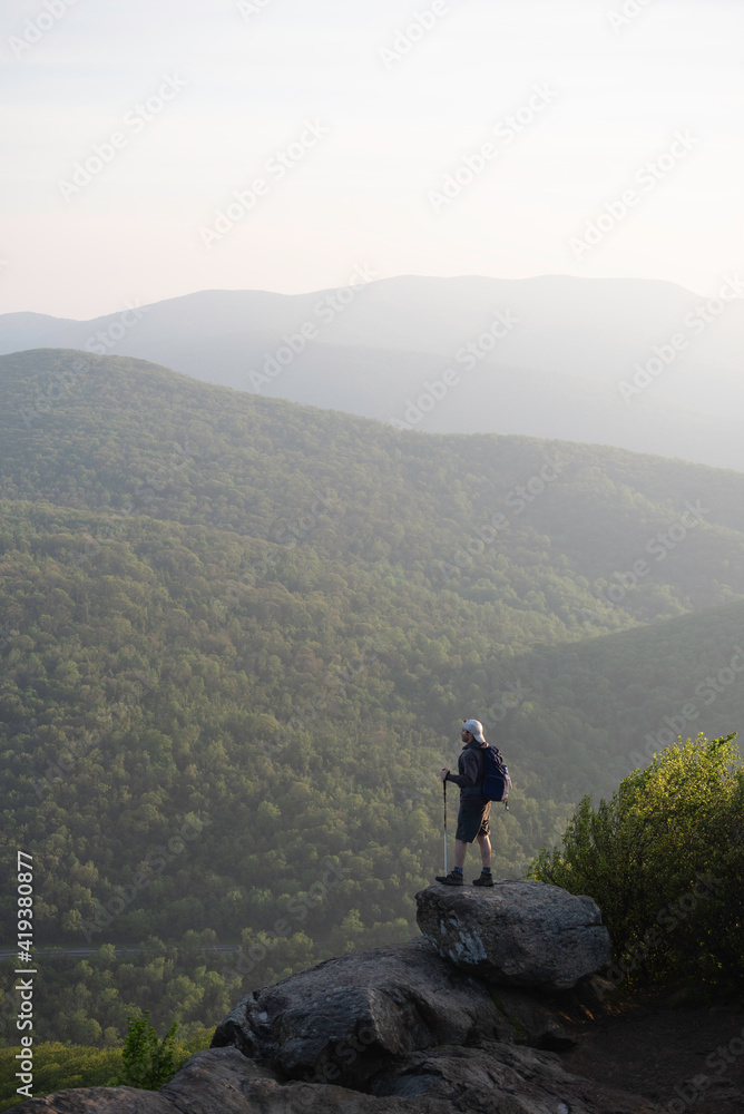A hiker enjoying the morning Summer haze of Shenandoah National Park in Virginia.