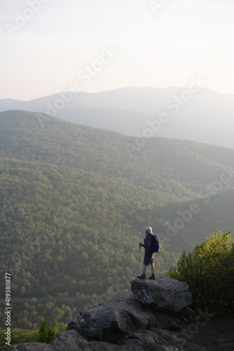 A hiker enjoying the morning Summer haze of Shenandoah National Park in Virginia.