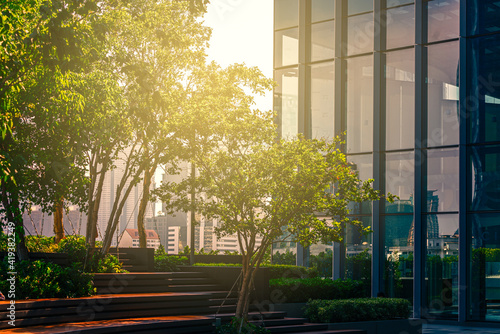 Photography Beautiful garden on rooftop of modern grass building in Asia, concept for corporate buildings