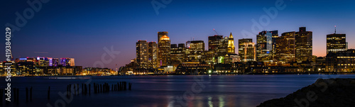 Panoramic Night Cityscape Boston Skyline and Sea Reflections from LoPresti Park in Boston, Massachusetts © Naya Na
