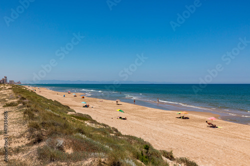 nude beach near city of Cullera   skyline with beach