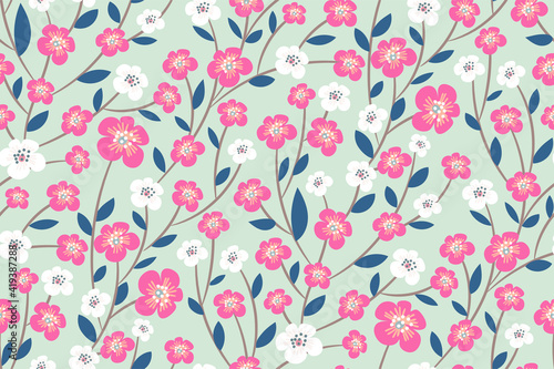Beautiful seamless floral pattern with spring cherry blossoms (sakura branches). Floral print in a delicate trendy color palette. Oriental botanical design for wallpaper, fabrics, tiles... Vector