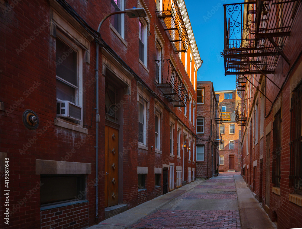 Historic alley with red brick buildings in East Boston Historic alley with red brick buildings in East Boston