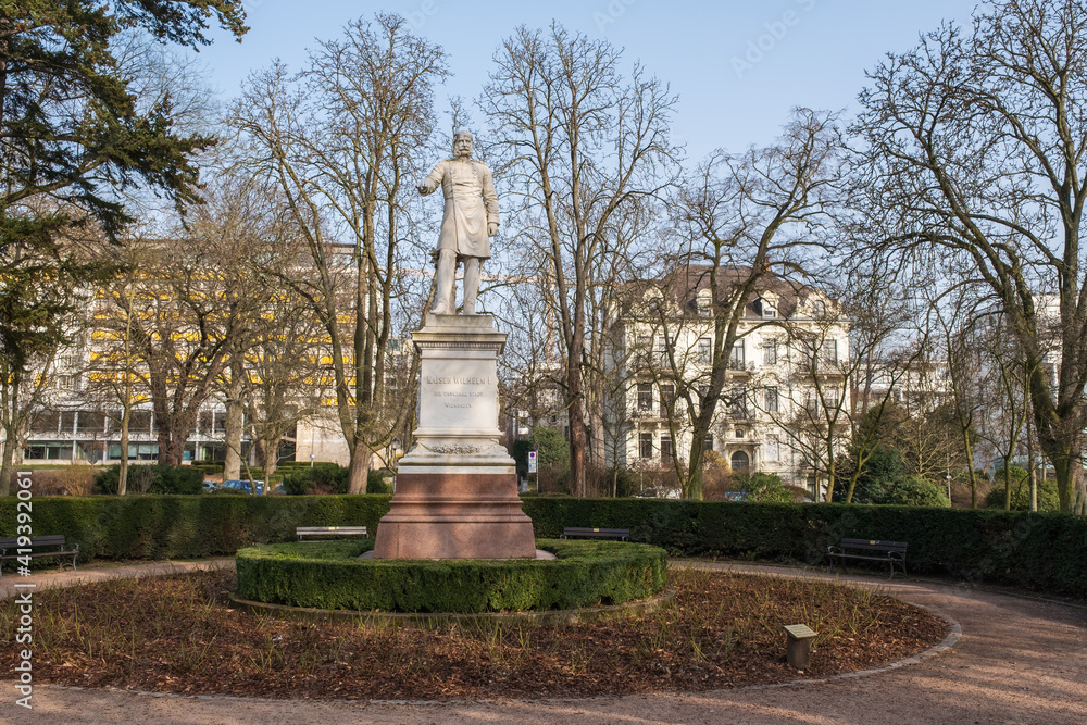 View towards the monument to Kaiser Wilhelm I in the spa gardens in Wiesbaden / Germany 