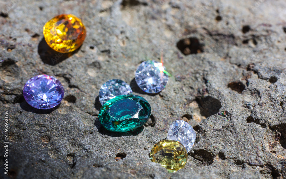 Natural Sapphire gemstone, Jewel or gems on black shine color, Collection of many natural gemstones on stone Natural Sapphire gemstone, Jewel or gems on black shine color, Collection of many natural gemstones on stone