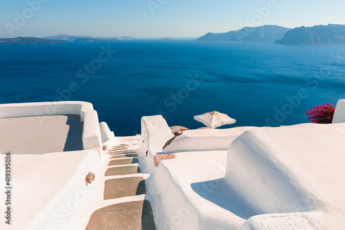 White architecture on Santorini island, Greece. Stairs down to the sea. Travel destinations concept