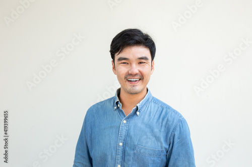 adult asian man.young male person wear eye glasses.posing smiling laughing look excited surprised thinking positive happy.empty,copy space for text advertising.white background.attractive fashion