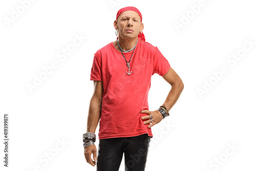 Funky man with a red scarf on his head and leather pants
