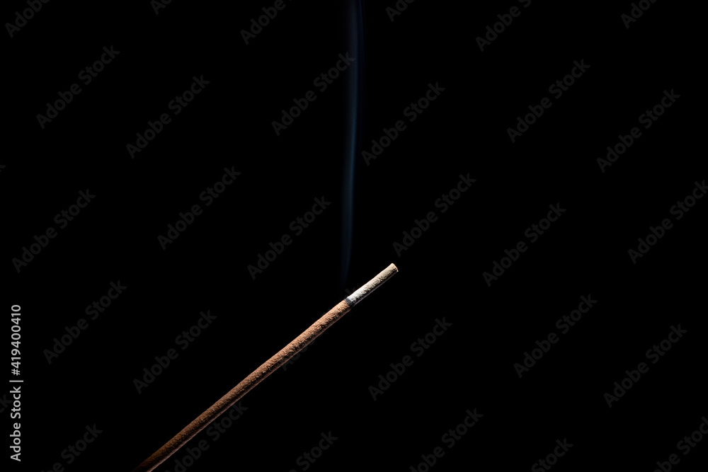 incense burner with smoke on black background. incense burner with smoke on black background.