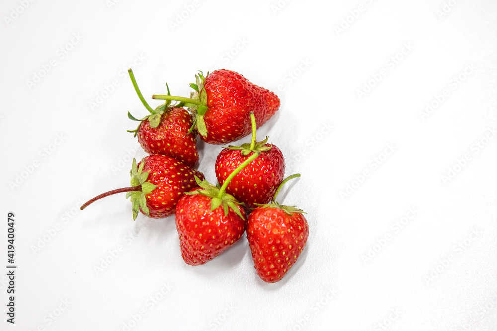 Strawberry isolated, with green leaf, closeup ,macro photo.