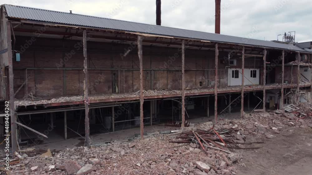 Abandoned half demolished ancient factory in Huizen, the Netherlands, Aerial Abandoned half demolished ancient factory in Huizen, the Netherlands, Aerial