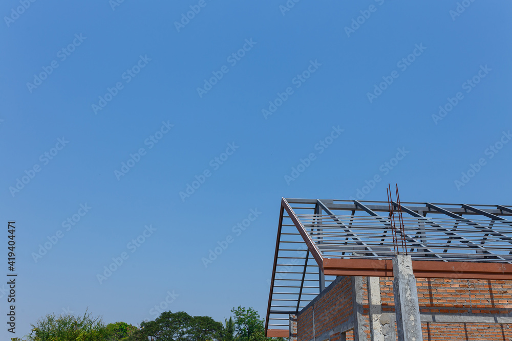 New House under construction under Blue sky. New House under construction under Blue sky.