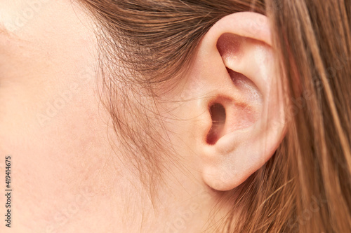 closeup picture of young woman ear