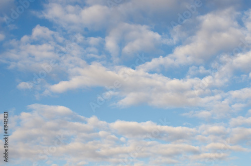 Sky, blue, saturated, bright colors and many clouds