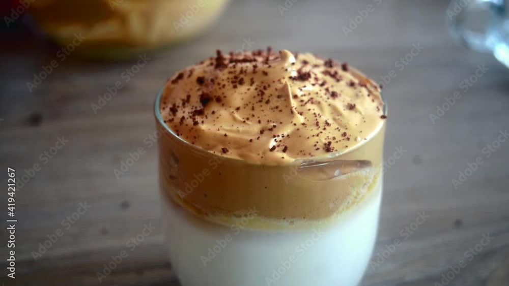 Sliding view of garnishing a cup of Whipped coffee. Garnishing coffee with instant coffee slider view. Traditional mocha garnishing by instant coffee. latte garnishing by cocoa powder. Sliding view of garnishing a cup of Whipped coffee. Garnishing coffee with instant coffee slider view. Traditional mocha garnishing by instant coffee. latte garnishing by cocoa powder.