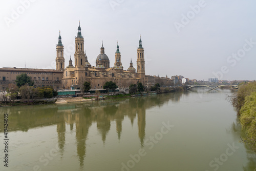 view of the historic cathedral in Zaragoza and the Ebro River © makasana photo