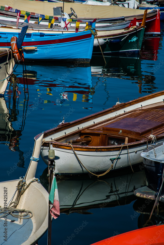 boats aligned along harbour in Genoa Italy boats aligned along harbour in Genoa Italy