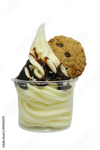 soft serve ice cream in a cup with topping.