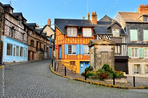 Slika na platnu Historic half timbered buildings in the the beautiful town of Honfleur, France