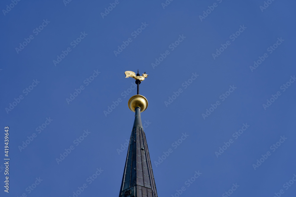 Top of church tower of St. Jakob church at Zurich Stauffacher. Photo taken March 10th, 2021, Zurich, Switzerland. Top of church tower of St. Jakob church at Zurich Stauffacher. Photo taken March 10th, 2021, Zurich, Switzerland.