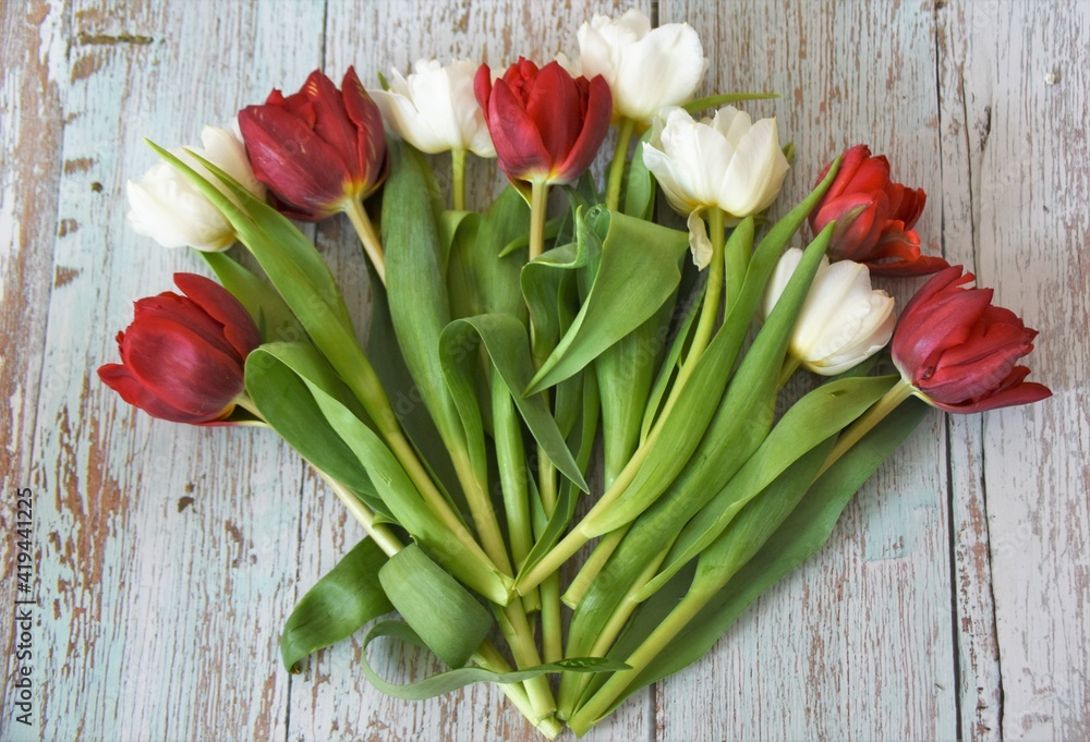 bouquet of tulips on a wooden table bouquet of tulips on a wooden table