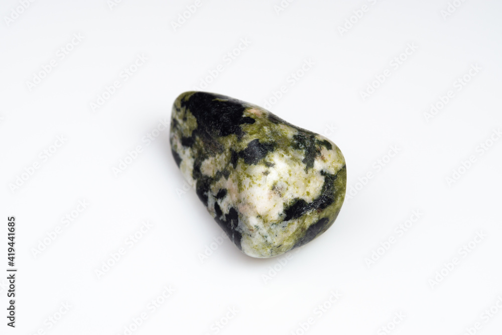 Natural stone green serpentine on a white background Natural stone green serpentine on a white background