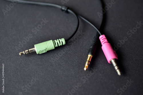 3.5 mm headphone and microphone jack on black background