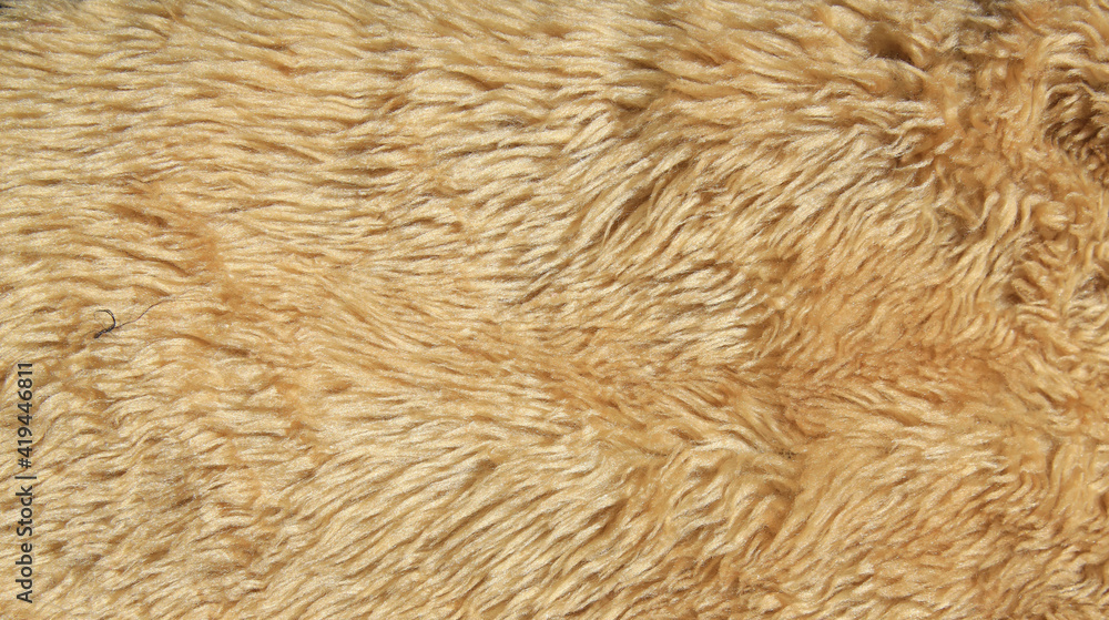 Fototapeta premium Close up brown artificial fur texture , Mat Brown wool