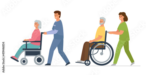 Elderly people with disabilities in wheelchairs and medical workers. A walk for patients from a nursing home.