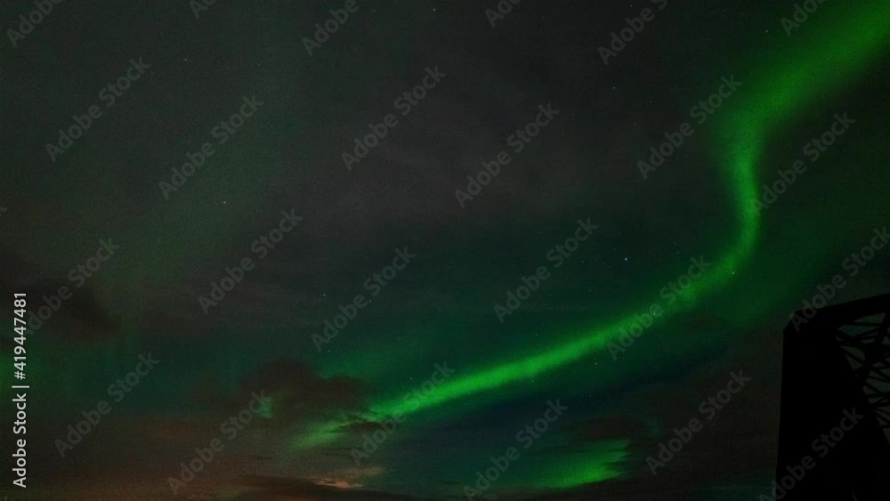 Green and purple Northern lights over south Iceland - time lapse video Green and purple Northern lights over south Iceland - time lapse video