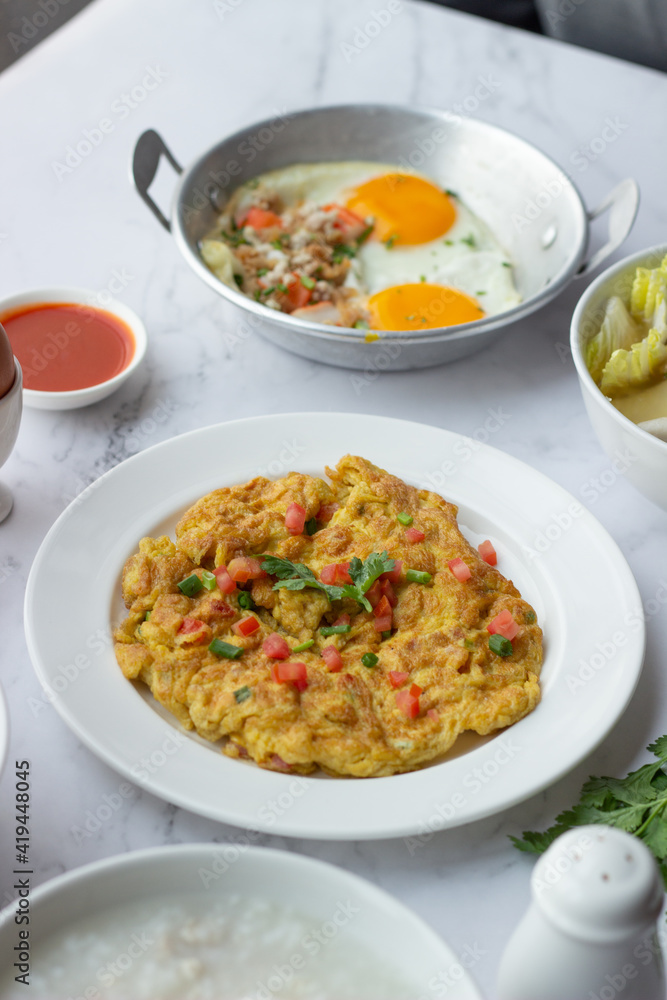 American and Thai breakfast set on the marble background American and Thai breakfast set on the marble background