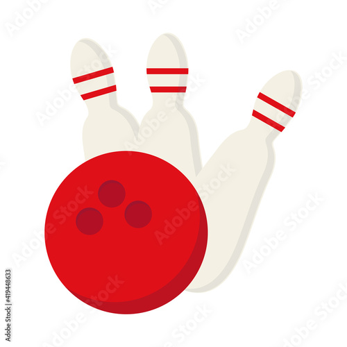 Three skittles and a red bowling ball