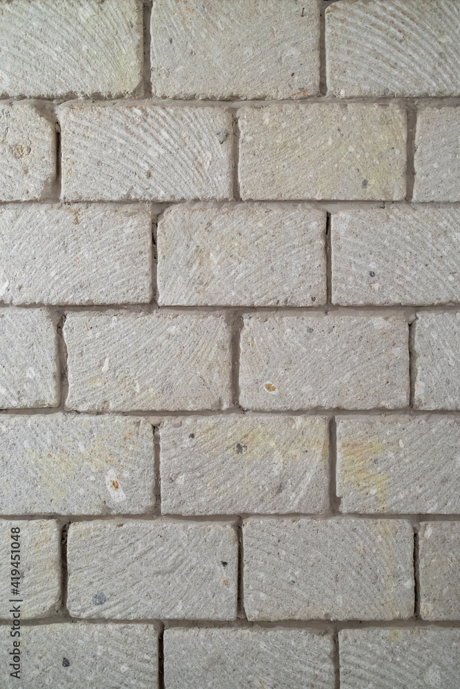 wall built of stone blocks of tuff wall built of stone blocks of tuff