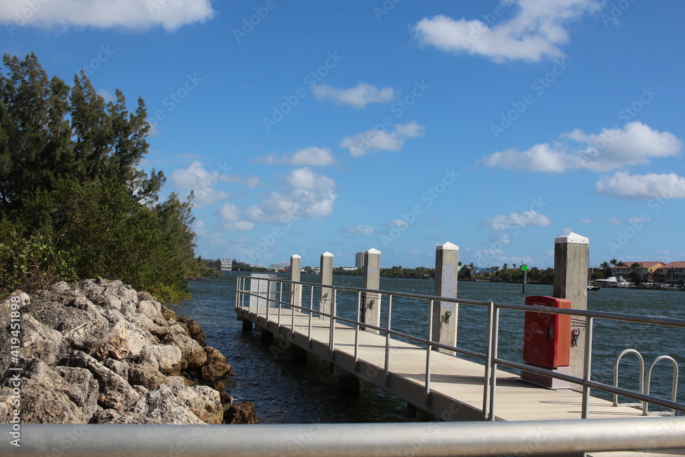 boat dock on an intercoastal  wide shot in the day