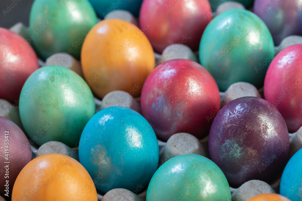 Easter background with hand painted purple, blue, green, orange Easter background with hand painted purple, blue, green, orange