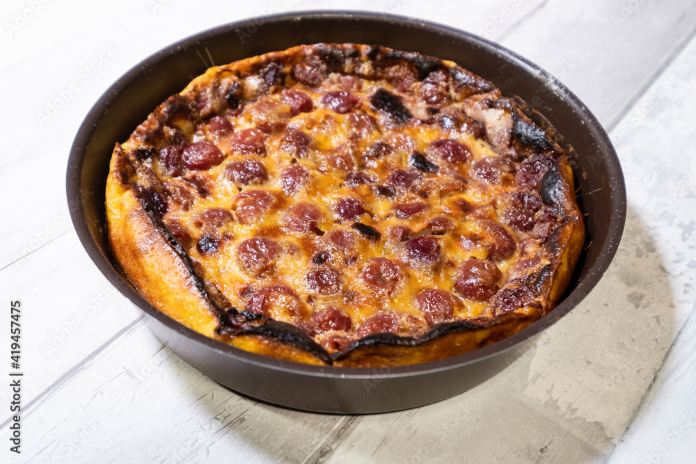 Appetizing cherry clafoutis made at home in the old fashioned way in France