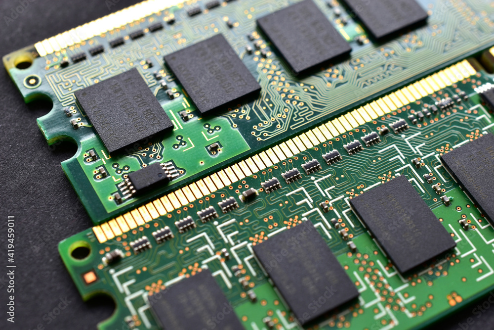 Green computer RAM bars on a black background Green computer RAM bars on a black background
